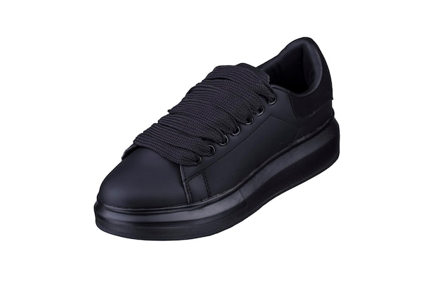 Une sneaker noire sur fond blanc Chaussures de sport