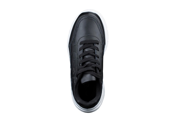 Une sneaker noire sur fond blanc Chaussures de sport