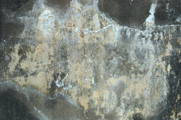 Sol en ciment usé vintage avec peinture décolorée et mousse collant un fond abstrait rustique