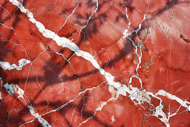 Photo un sol en marbre rouge avec un motif en marbre blanc et rouge
