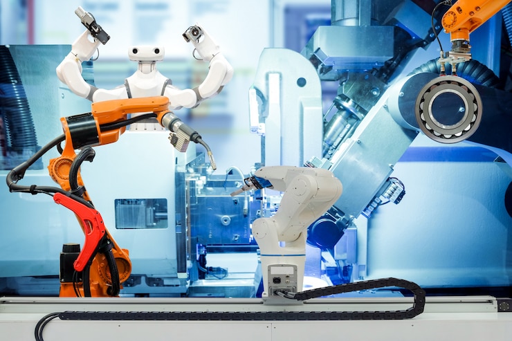 Photo soudure robotique industrielle, préhension de robot et robot intelligent travaillant sur une usine intelligente