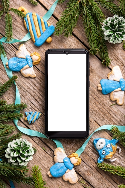 Souvenirs de Noël avec sapin de Noël et téléphone pour votre texte