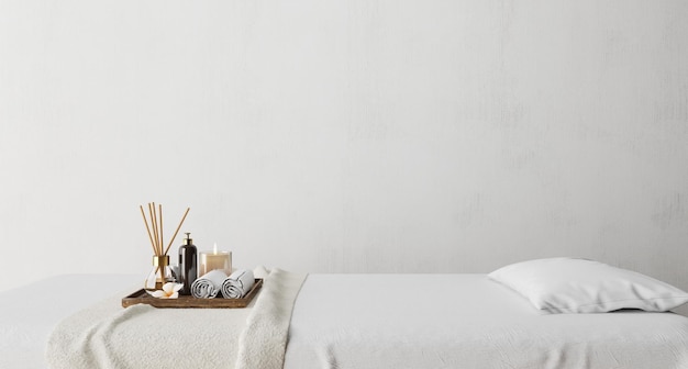 Spa et lit de massage avec fond de mur blanc