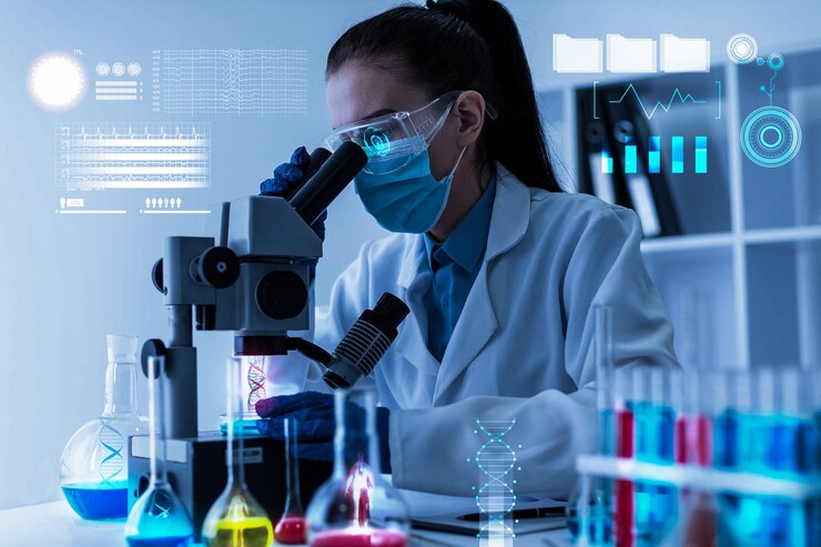 Photo spécialiste en biotechnologie au laboratoire menant des expériences