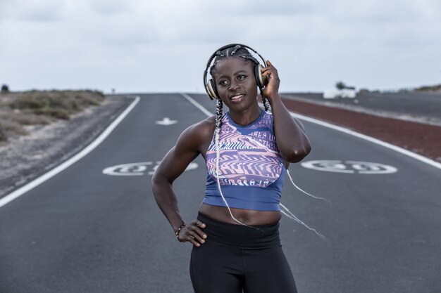 sportive, écouter de la musique sur la route