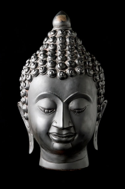 Statue de Bouddha sur fond noir