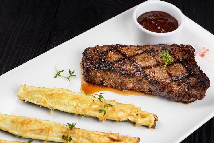 Photo steak black angus grillé new york