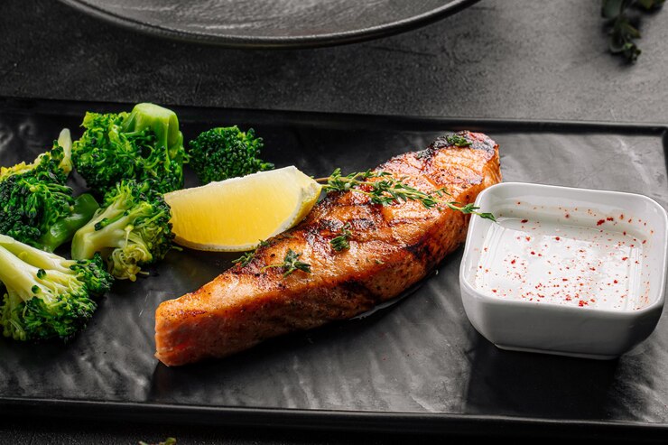 Photo steak de filet de saumon grillé avec du brocoli