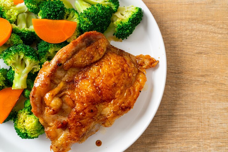 Photo steak de poulet teriyaki aux brocolis et carottes