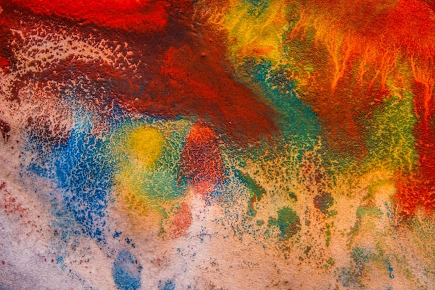 Stries séchées de base de fond abstrait de peinture multicolore avec des fissures