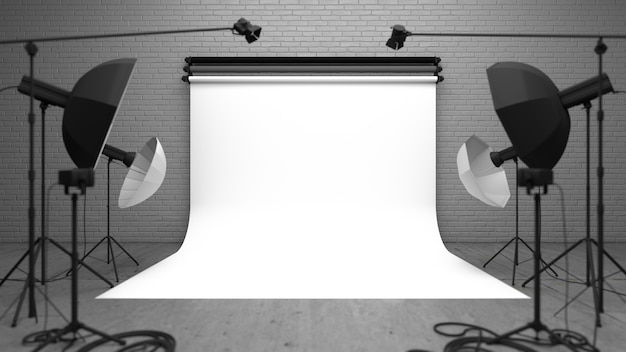 Studio de photographie avec fond blanc et équipement d'éclairage.