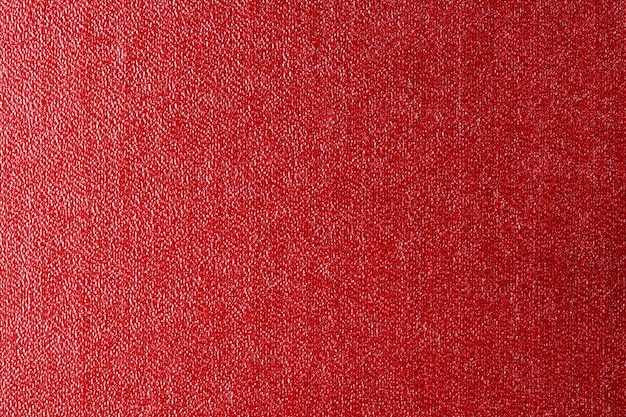 Substitut dermantine pour cuir naturel fond texturé rouge close-up macro photographie plus de détails