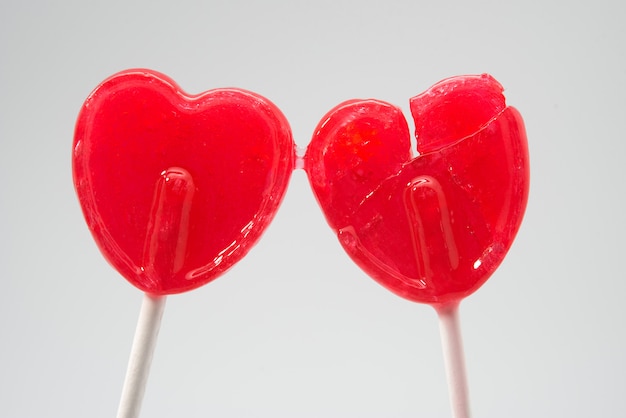 Photo sucette coeur rouge brisé