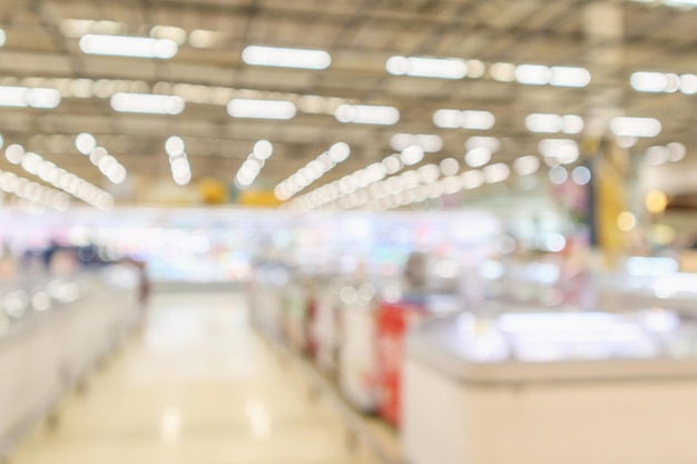 Supermarché épicerie intérieur flou fond défocalisé avec lumière bokeh