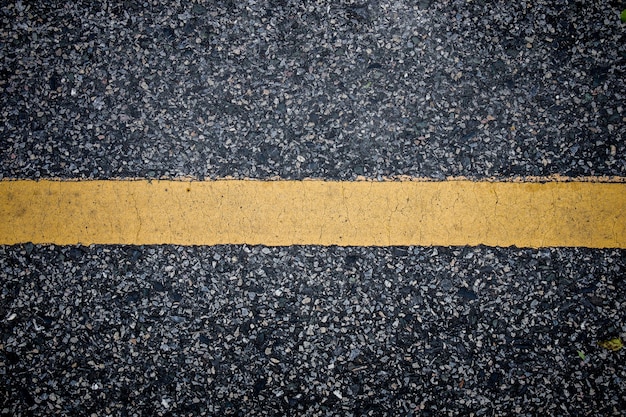 Surface de l&#39;asphalte de la route avec des lignes abstraites