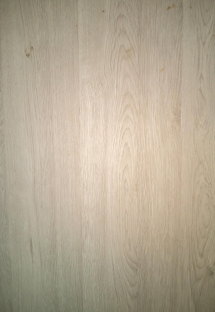 Photo surface en bois artificiel motif naturel brun vertical beau motif en bois texture d'arrière-plan
