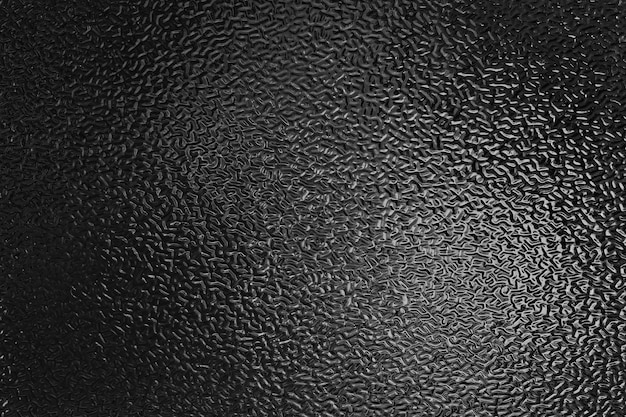 Surface du fond en verre noir pour la toile de fond de l'objet design