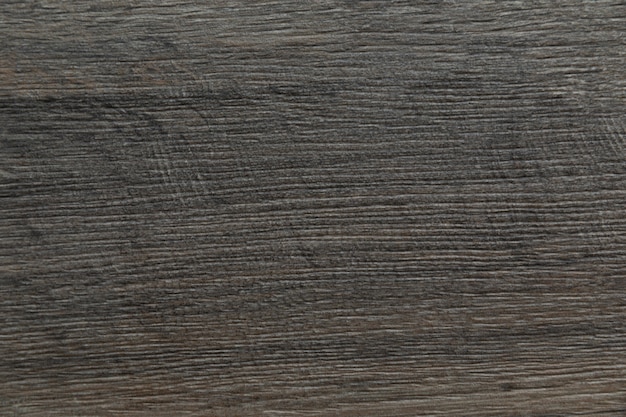 Surface de fond de texture bois gris foncé et brun avec un vieux motif naturel et des lignes nettes