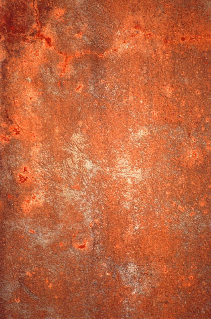 Photo surface de mur de pierre ou de brique vieille et usée, vue rapprochée, fond avec plâtre
