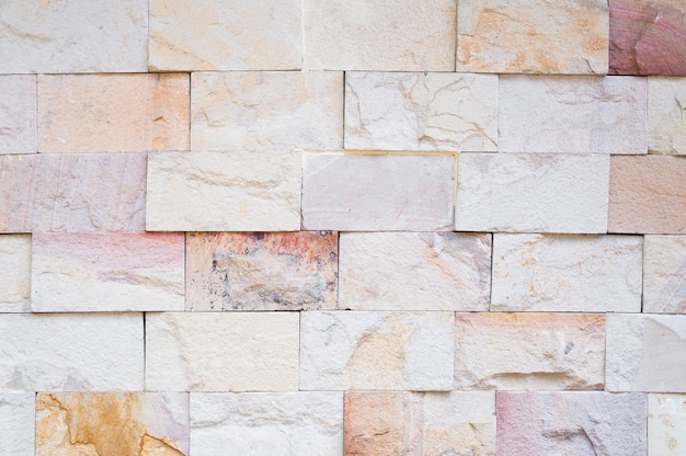 Surface de mur en pierre décorative inégale avec fond de mur en pierre de ciment