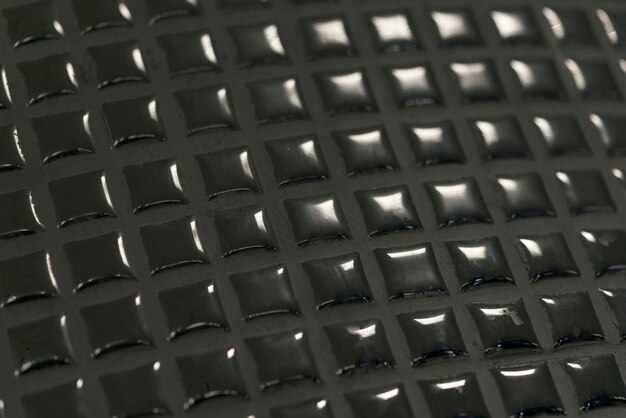 Surface noire brillante avec rivets Texture métal