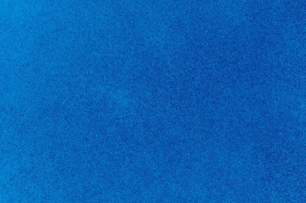 Surface de papier rigide rugueux de couleur bleue vue rapprochée pour le fond de texture
