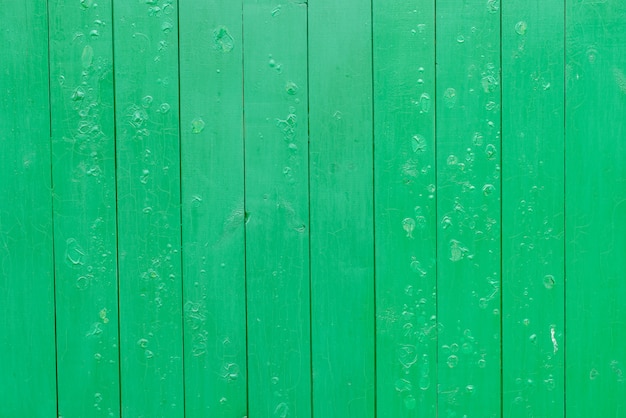 Surface de planches de bois vert ancien