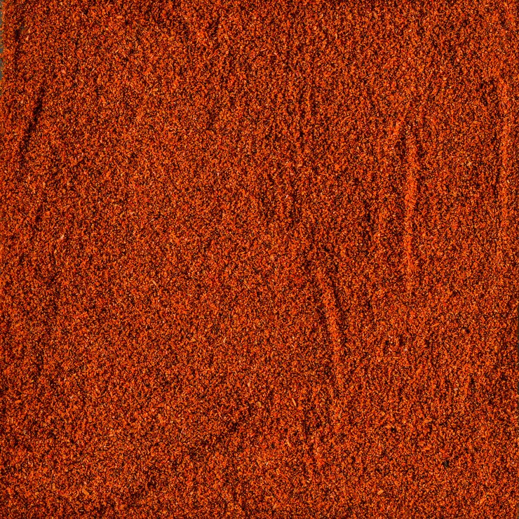 Surface recouverte de poudre de paprika rouge