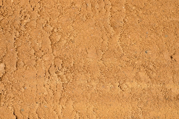 Surface de sable texturé comme arrière-plan, vue de dessus