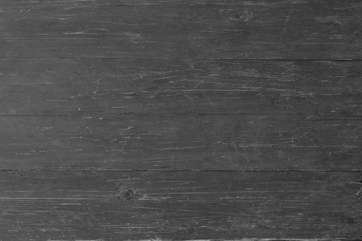 Photo surface de table de texture bois noir de fond de planches sombres