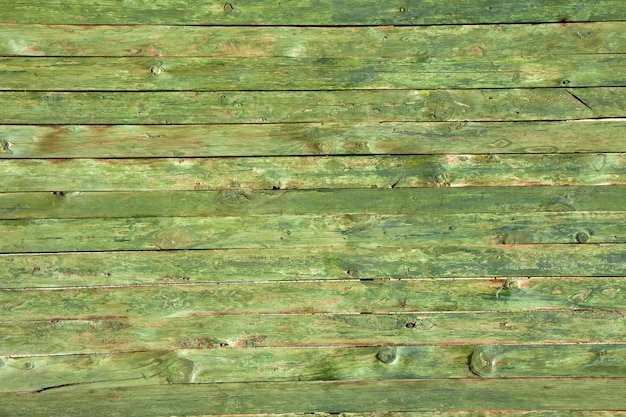 Surface de texture bois vert comme toile de fond