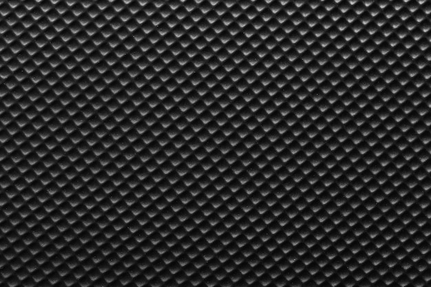 Surface de la texture en plastique noir ou en nylon noir.