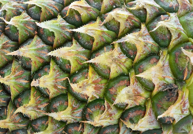 Surface texturée d'ananas sur toute la longueur en arrière-plan