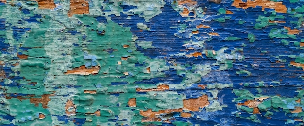 Surface texturée en bois de bannière avec peinture colorée écaillée abstrait multicolore