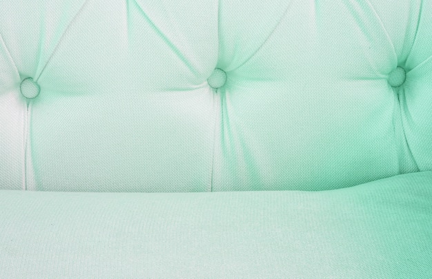 surface tissu vert sur le canapé fond texturé