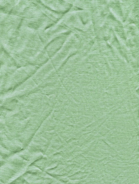 Surface de tissu vert pour le fond Texture de lin vert Fond de lin vert