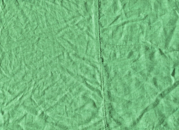 Surface de tissu vert pour le fond Texture de lin vert Fond de lin vert
