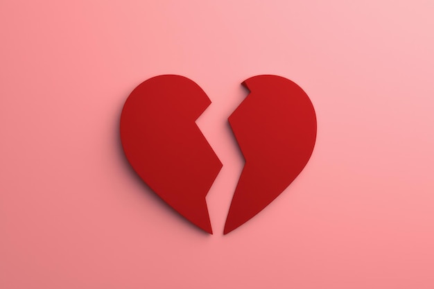 Le symbole du cœur de papier rouge cassé
