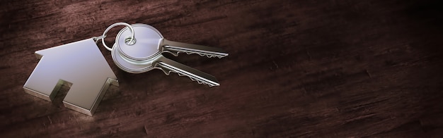 Symbole d'une maison avec clé en argent