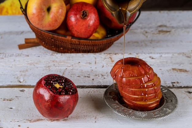 Symboles de vacances traditionnels miel, pomme et grenade rosh hashanah jewesh holiday