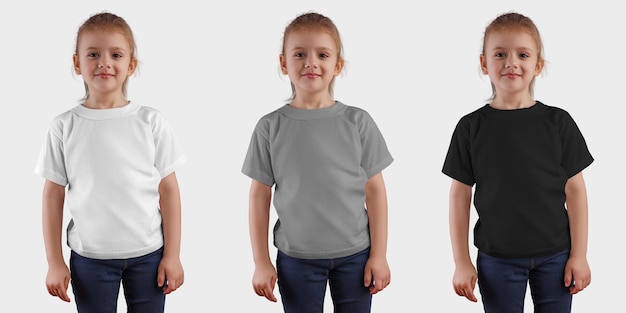 T-shirt blanc sur une fille en jean bleu et une main sur la taille des vêtements vides sur un enfant