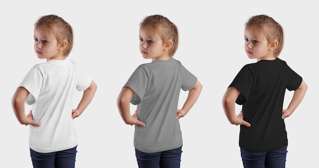 T-shirt blanc sur une fille en jean bleu et une main sur la taille des vêtements vides sur un enfant