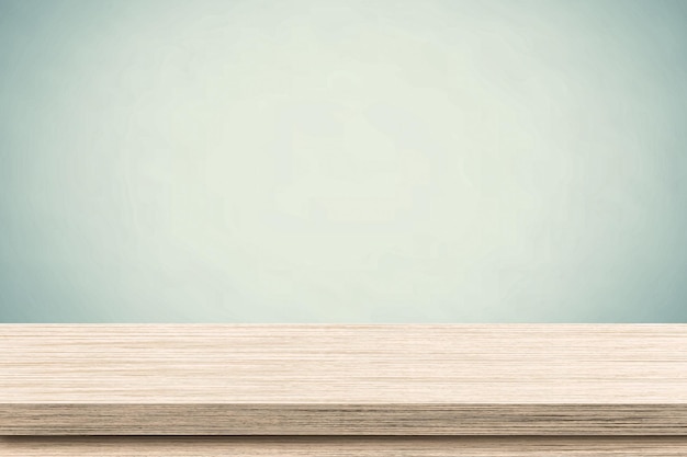 Table en bois et mur bleu