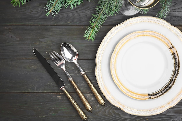 Table en bois noir avec cadre de table de Noël élégant