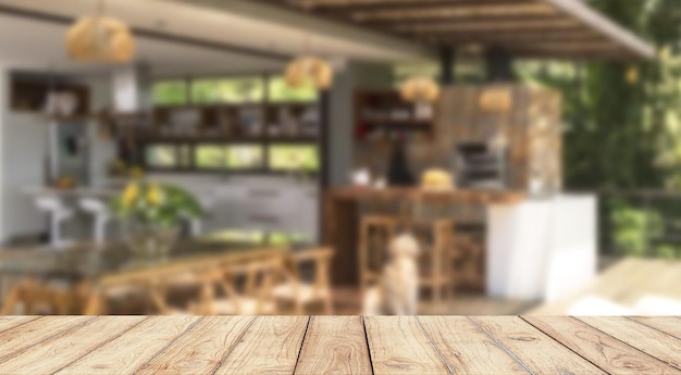 Table en bois vide avec cuisine vintage floue sur fond