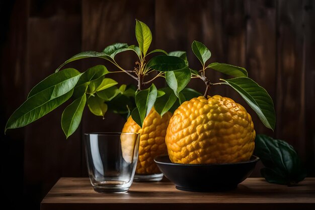 une table avec un bol de fruits et une tasse d'eau