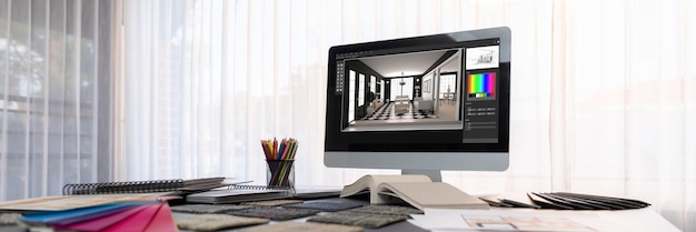 Table d'espace de travail de designer d'intérieur et logiciel d'architecture sur écran d'ordinateur portable avec matériaux de tableau d'humeur et échantillon de couleur coloré pour la sélection des couleurs Bureau de design d'intérieur moderne Insight