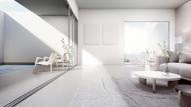 Table à manger près d'un canapé blanc sur moquette grise d'un grand salon dans une maison moderne ou une villa de luxe