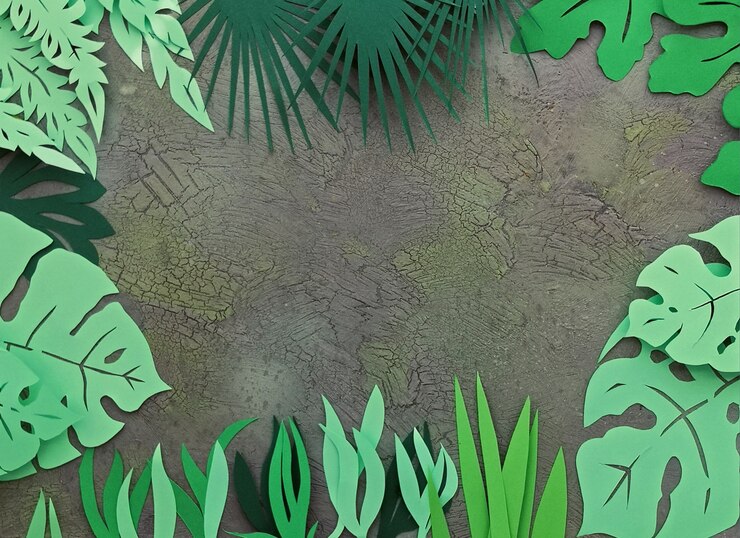 Photo tableau floral foncé avec des feuilles tropicales en papier.