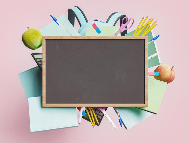 Photo tableau noir vide avec des fournitures scolaires